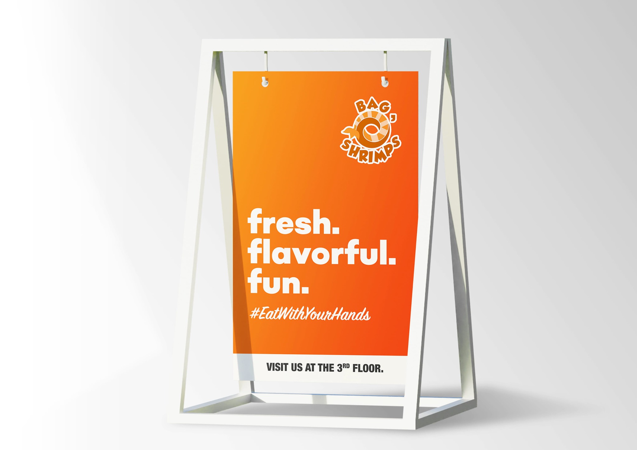 Bag O' Shrimps orange restaurant campaign sign with fresh flavorful fun messaging